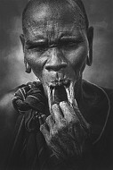 Woman from Mursi tribe